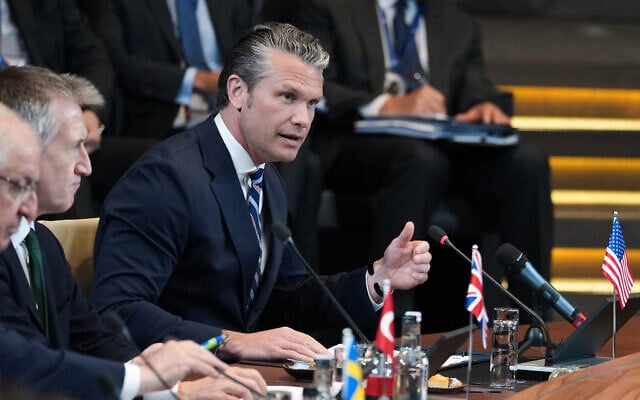 US Defense Secretary Pete Hegseth, right, speaks during a meeting of the North Atlantic Council in defense ministers format at NATO headquarters in Brussels, on June 18, 2026. (AP Photo/Virginia Mayo) US Defense Secretary Pete Hegseth, right, speaks during a meeting of the North Atlantic Council in defense ministers format at NATO headquarters in Brussels, on June 18, 2026. (AP Photo/Virginia Mayo)