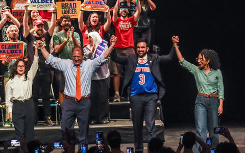 Democratic congressional candidates, Claire Valdez Brad Lander, and Darializa Avila Chevalier gesture on stage with Mayor Zohran Mamdani during a Get Out The Vote rally ahead of New York's primary election in New York City, June 18, 2026. (AP Photo/Ryan Murphy)