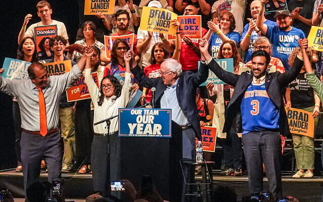 From left, Democratic congressional candidates Brad Lander, Claire Valdez, Sen. Bernie Sanders, New York City Mayor Zohran Mamdani and candidate Darializa Avila Chevalier on stage during a rally ahead of New York's primary election, June 18, 2026, in Brooklyn. (AP Photo/Ryan Murphy)