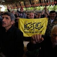 Iranian worshippers chant slogans during Friday prayers ceremony at the Tehran University campus in Tehran, Iran, June 19, 2026. (AP/Vahid Salemi)