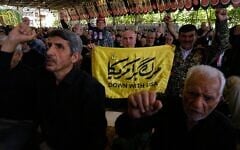 Iranian worshippers chant slogans during Friday prayers ceremony at the Tehran University campus in Tehran, Iran, June 19, 2026. (AP/Vahid Salemi)