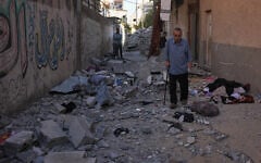 Residents inspect the rubble of the apartment of the Palestinian Safadi family in Gaza City, June 20, 2026, following an overnight Israeli airstrike. (AP Photo/Abdel Kareem Hana)