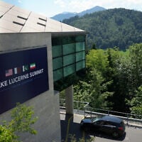 A sign for the Lake Lucerne Summit at the Bürgenstock during a meeting between US Vice President JD Vance and Pakistan's Prime Minister Shehbaz Sharif for high-level talks aimed at advancing a deal to end the Middle East conflict, in Obbuergen, Switzerland, June 21, 2026. (Nathan Howard/Pool Photo via AP)
