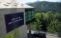 A sign for the Lake Lucerne Summit at the Bürgenstock during a meeting between US Vice President JD Vance and Pakistan's Prime Minister Shehbaz Sharif for high-level talks aimed at advancing a deal to end the Middle East conflict, in Obbuergen, Switzerland, June 21, 2026. (Nathan Howard/Pool Photo via AP)