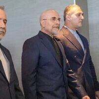 Iranian Foreign Minister Abbas Araghchi, left, and Speaker of the Islamic Parliament of Iran, Mohammed Bagher Ghalibaf, 2nd from left, with the Delegation of Iran at the Lake Lucerne Summit at the Buergenstock resort in Obbuergen, near Lucerne, Switzerland, June 21, 2026. (Urs Flueeler, Pool Photo via AP)