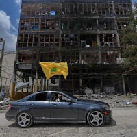 A man with a Hezbollah flag drives past a damaged building following a ceasefire between Israel and Hezbollah in the town of Nabatiyeh, southern Lebanon, June 22, 2026. (AP/ Mohammed Zaatari) A man with a Hezbollah flag drives past a damaged building following a ceasefire between Israel and Hezbollah in the town of Nabatiyeh, southern Lebanon, June 22, 2026. (AP/ Mohammed Zaatari)