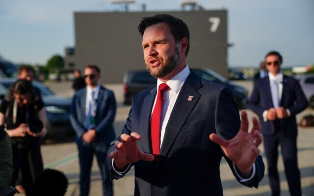 US Vice President JD Vance speaks to members of the media before boarding Air Force Two at Emmen Military Air Base, Emmen, Switzerland, Monday, June 22, 2026, after the US and Iran held high-level talks at the Lake Lucerne Summit. (Nathan Howard/Pool Photo via AP)