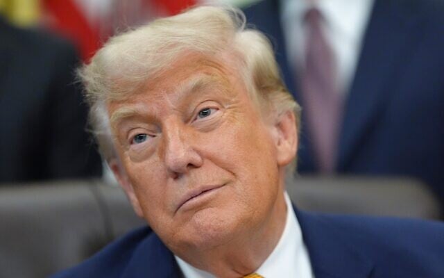 US President Donald Trump is pictured in the Oval Office of the White House during an executive order signing about quantum computing, June 22, 2026, in Washington. (AP Photo/Jacquelyn Martin)