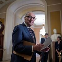 US Senate Minority Leader Chuck Schumer, a Democrat from New York, speaks to reporters at the Capitol in Washington, June 23, 2026. (AP Photo/J. Scott Applewhite)
