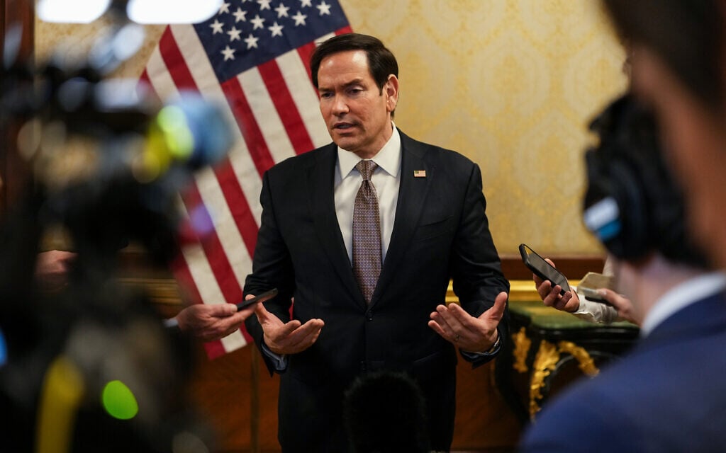 US Secretary of State Marco Rubio speaks to members of the media before boarding a US Air Force C-17 Globemaster III transport aircraft en route to Bahrain at Kuwait International Airport, in Kuwait City, Kuwait, June 24, 2026. (Eric Lee/Pool Photo via AP)