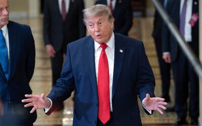 US President Donald Trump heads to a meeting with Senate Republicans at the Capitol in Washington, June 24, 2026.  (Jose Luis Magana/AP)