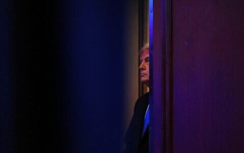 US President Donald Trump stands before speaking at the Faith & Freedom Coalition's policy conference at the Washington Hilton, June 26, 2026, in Washington. (AP Photo/Julia Demaree Nikhinson)