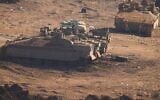 Israeli military APCs parked in northern Israel, near the border with Lebanon, Saturday, June 27, 2026 (AP Photo/Ariel Schalit)