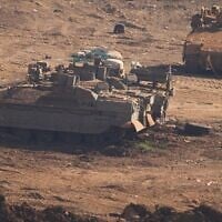 Israeli military APCs parked in northern Israel, near the border with Lebanon, Saturday, June 27, 2026 (AP Photo/Ariel Schalit)