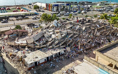 This aerial picture shows buildings destroyed during twin earthquakes in Caraballeda, La Guaira state, Venezuela, on June 27, 2026. (Miguel Medina/Pool Photo via AP)