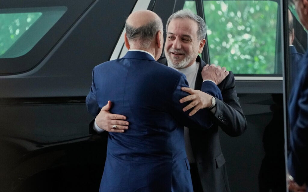 Iranian Foreign Minister Abbas Araghchi, right, arrives to meet his Iraqi counterpart Fouad Hussein in Baghdad, Iraq, June 28, 2026. (AP Photo/Hadi Mizban)