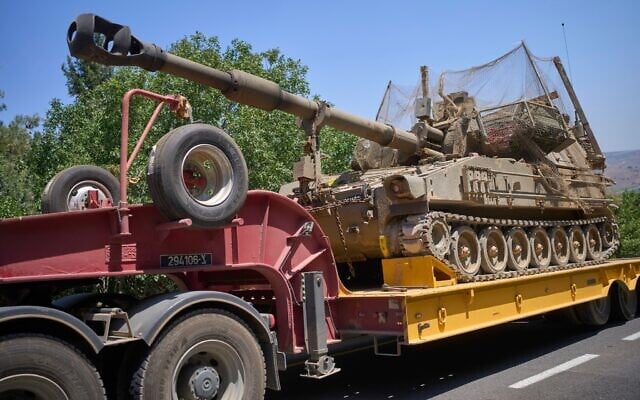 An IDF mobile artillery unit is being loaded onto a transport truck on a road in northern Israel, June 28, 2026. (AP Photo/Ohad Zwigenberg)