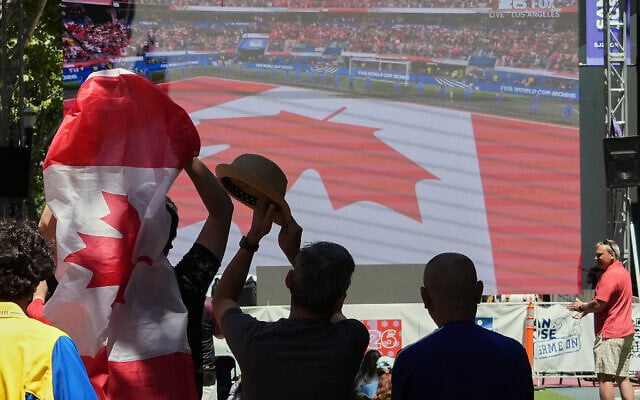 Illustration: People watch a public viewing of the World Cup round of 32 soccer match between South Africa and Canada Sunday, June 28, 2026, in San Jose, Calif. (AP/Eugene Hoshiko)