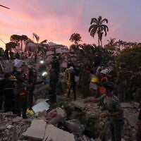 Rescuers search a building for earthquake survivors in La Guaira, Venezuela, Sunday, June 28, 2026 (AP/Matias Delacroix)