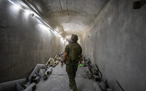 An Israeli soldier is seen in an underground Hezbollah drone facility in Majdal Zoun, southern Lebanon, on June 18, 2026. (Emanuel Fabian/Times of Israel)