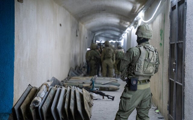 An Israeli soldier is seen in an underground Hezbollah drone facility in Majdal Zoun, southern Lebanon, on June 18, 2026. (Emanuel Fabian/Times of Israel)