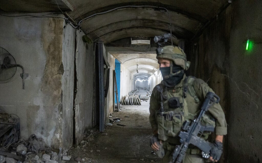 An Israeli soldier is seen in an underground Hezbollah drone facility in Majdal Zoun, southern Lebanon, on June 18, 2026. (Emanuel Fabian/Times of Israel)
