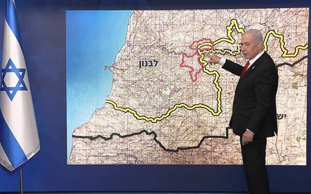Prime Minister Benjamin Netanyahu points at areas where the IDF will withdraw from as part of a US-mediated agreement with Lebanon, during a press conference on June 27, 2026. (YouTube Screenshot)