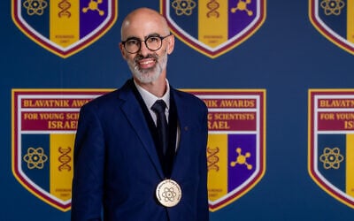 Paz Beniamini receives his Blavatnik Young Scientists Award, June 2, 2026. (Eran Be'eri)