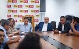Party leaders Ayman Odeh (center left) and Ahmad Tibi (center right) seen during a Hadash–Ta'al faction meeting at the Knesset in Jerusalem on May 12, 2025. (Yonatan Sindel/Flash90)
