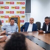 Party leaders Ayman Odeh (center left) and Ahmad Tibi (center right) seen during a Hadash–Ta'al faction meeting at the Knesset in Jerusalem on May 12, 2025. (Yonatan Sindel/Flash90)