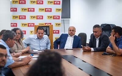 Party leaders Ayman Odeh (center left) and Ahmad Tibi (center right) seen during a Hadash–Ta'al faction meeting at the Knesset in Jerusalem on May 12, 2025. (Yonatan Sindel/Flash90)