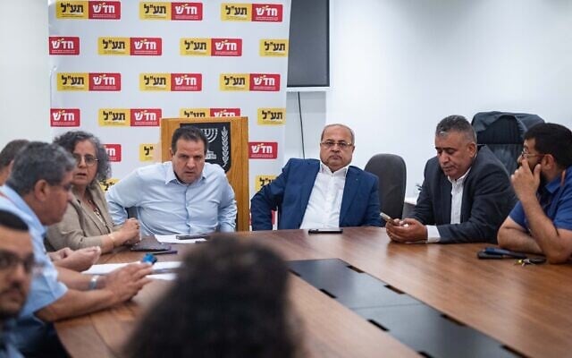 Party leaders Ayman Odeh (center left) and Ahmad Tibi (center right) seen during a Hadash–Ta'al faction meeting at the Knesset in Jerusalem on May 12, 2025. (Yonatan Sindel/Flash90) Party leaders Ayman Odeh (center left) and Ahmad Tibi (center right) seen during a Hadash–Ta'al faction meeting at the Knesset in Jerusalem on May 12, 2025. (Yonatan Sindel/Flash90)