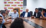 Party leaders Ayman Odeh (center left) and Ahmad Tibi (center right) seen during a Hadash–Ta'al faction meeting at the Knesset in Jerusalem on May 12, 2025. (Yonatan Sindel/Flash90)