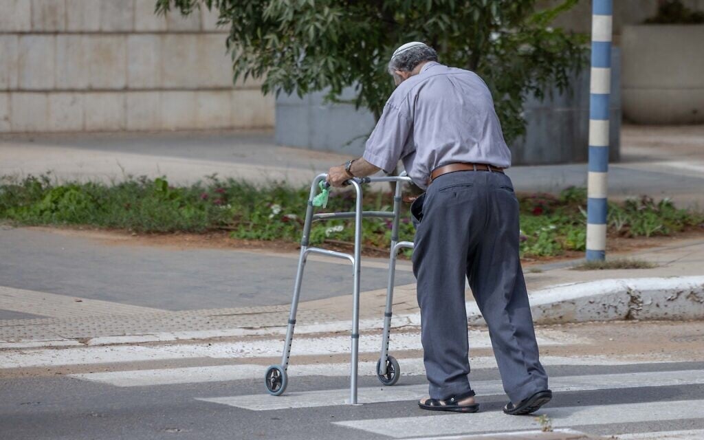 Illustration of an elderly man walking with a walker, August 31, 2025. (Yossi Aloni/FLASH90)