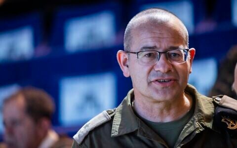 Incoming Mossad Director Maj. Gen. Roman Gofman attends a ceremony marking the lighting of the first Hanukkah candle of the 7th Armored Brigade at the National Library in Jerusalem, December 14, 2025. (Chaim Goldberg/Flash90)
