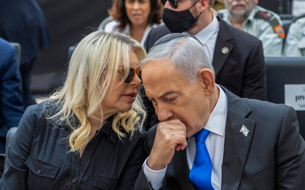 Prime Minister Benjamin Netanyahu and his wife Sara attend a state memorial ceremony at Mount Herzl military cemetery in Jerusalem, April 21, 2026, during Memorial Day. (Dor Pazuelo/Flash90)