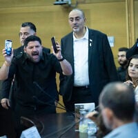 Almog Cohen, of the Otzma Yehudit party, disrupts an event about settler violence, in the Knesset in Jerusalem, June 2, 2026. (Yonatan Sindel/Flash90)