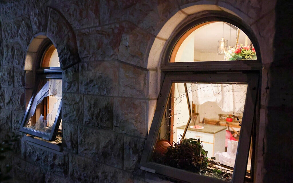 Smashed windows are seen at the home of Supreme Court Deputy Chief Justice Noam Sohlberg in the settlement of Alon Shvut following a riot by Haredi demonstrators, June 3, 2026. (Chaim Goldberg/Flash90)