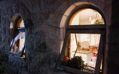 Smashed windows are seen at the home of Supreme Court Deputy Chief Justice Noam Sohlberg in the settlement of Alon Shvut following a riot by Haredi demonstrators, June 3, 2026. (Chaim Goldberg/Flash90)