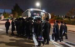 Ultra-Orthodox Jewish men, protesting against the jailing of yeshiva students who failed to comply with army recruitment orders, seen at the scene of a violent attack on the home of Supreme Court Deputy President Noam Sohlberg in the settlement of Alon Shvut, June 3, 2026. (Chaim Goldberg/Flash90)