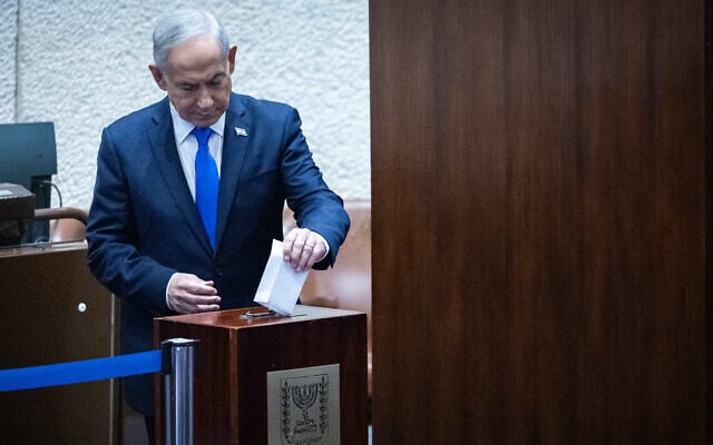 Prime Minister Benjamin Netanyahu votes for the next state comptroller at the Knesset, in Jerusalem, June 3, 2026 (Yonatan Sindel/Flash90)