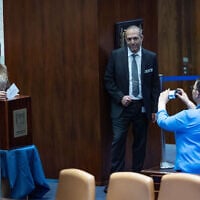 Minister for Social Equality and the Advancement of Women May Golan (left) votes for state comptroller, as MK Galit Distel Atbaryan takes a photo, at the plenum of the Knesset in Jerusalem, June 3, 2026. (Yonatan Sindel/Flash90)