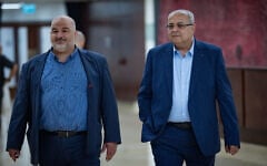 Ra'am party leader Mansour Abbas (left) and Ta'al chief Ahmad Tibi walk outside the office of Prime Minister Benjamin Netanyahu at the Knesset, June 3, 2026. (Yonatan Sindel/Flash90)