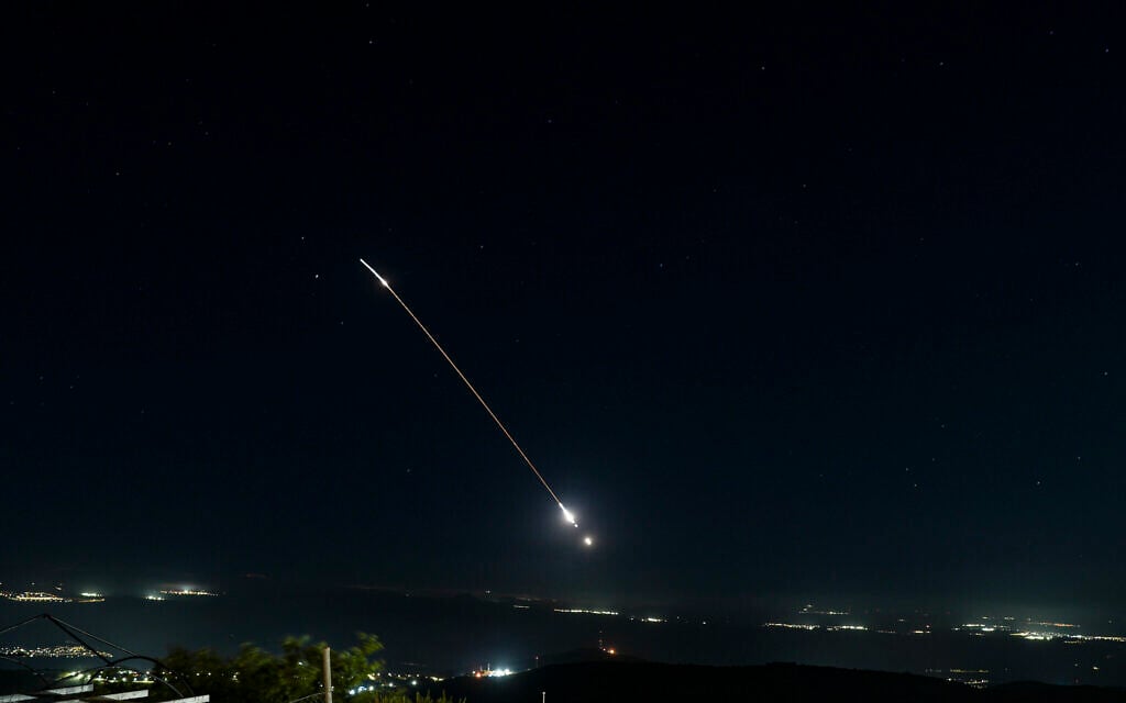 Israeli air defense system fire to intercept incoming ballistic missiles launched from Iran, as seen over northern Israel, June 7, 2026. (Ayal Margolin/Flash90)
