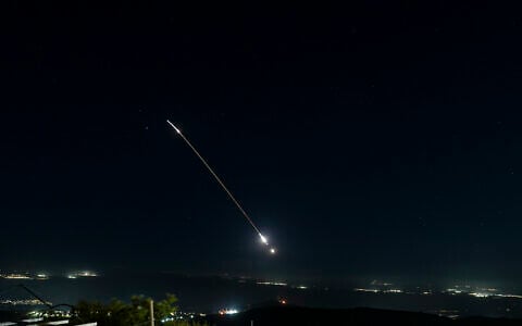 Israeli air defense system fire to intercept incoming ballistic missiles launched from Iran, as seen over northern Israel, June 7, 2026. (Ayal Margolin/Flash90)