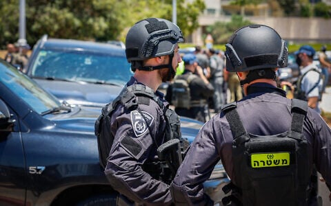 Security forces work the scene of a terrorist shooting attack at the entrance to Tzur Yitzhak, in central Israel, on June 7, 2026. (Tal Gal/Flash90)