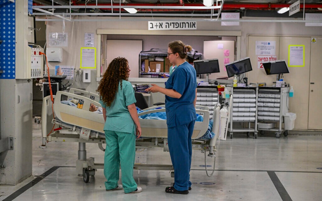 Patients and medical staff are seen in an underground parking area converted into a treatment ward at Ichilov Hospital in Tel Aviv, after many patients were relocated following renewed fighting and missile fire from Iran toward Israel, June 8, 2026 (Avshalom Sassoni/Flash90)