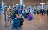 Passengers at Ben Gurion Airport near Tel Aviv on June 8, 2026. (Avshalom Sassoni/Flash90)