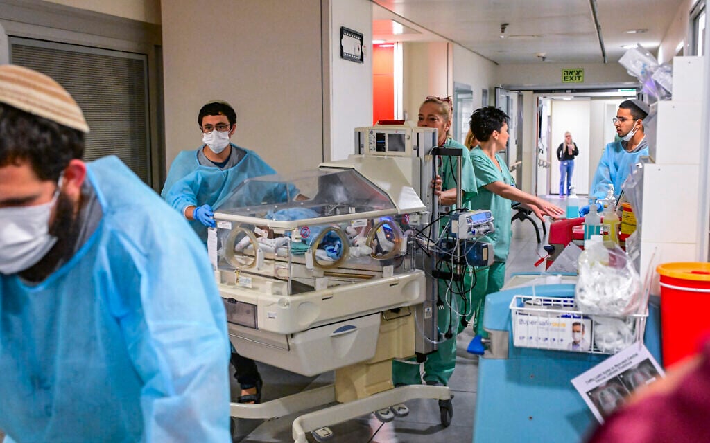Medical staff relocate NICU babies to an underground parking area converted into a treatment ward at Tel Aviv Sourasky Medical Center in Tel Aviv, after missile fire from Iran, June 8, 2026. (Avshalom Sassoni/Flash90)