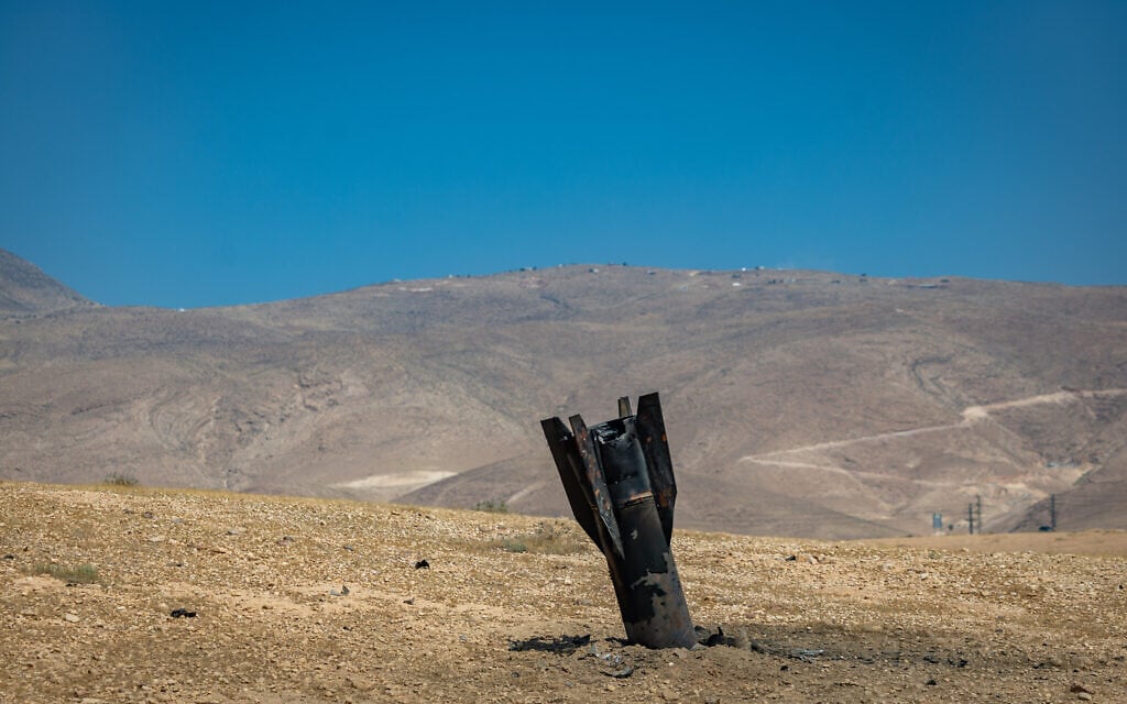 Part of an Iranian ballistic missile is seen in the desert near Vered Yeriho in the West Bank after being fired toward Israel from Iran, June 8, 2026 (Chaim Goldberg/Flash90)